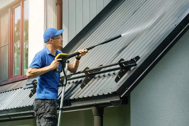 Soft washing the siding of a house