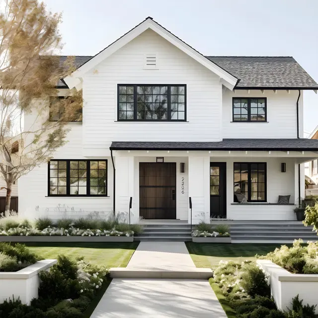 Clean white two-story house and front walk