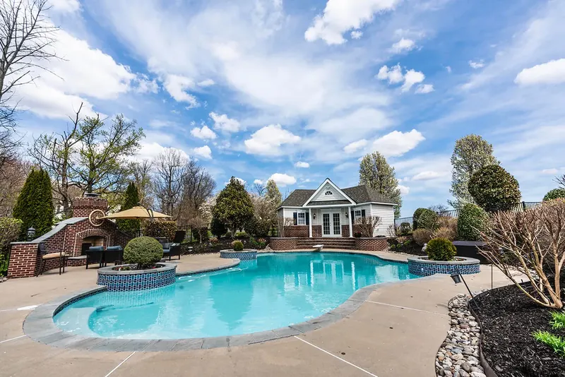 Clean home with a pool and patio